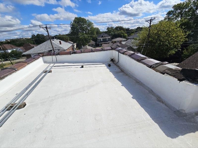 White TPO membrane on a low slope commercial roof