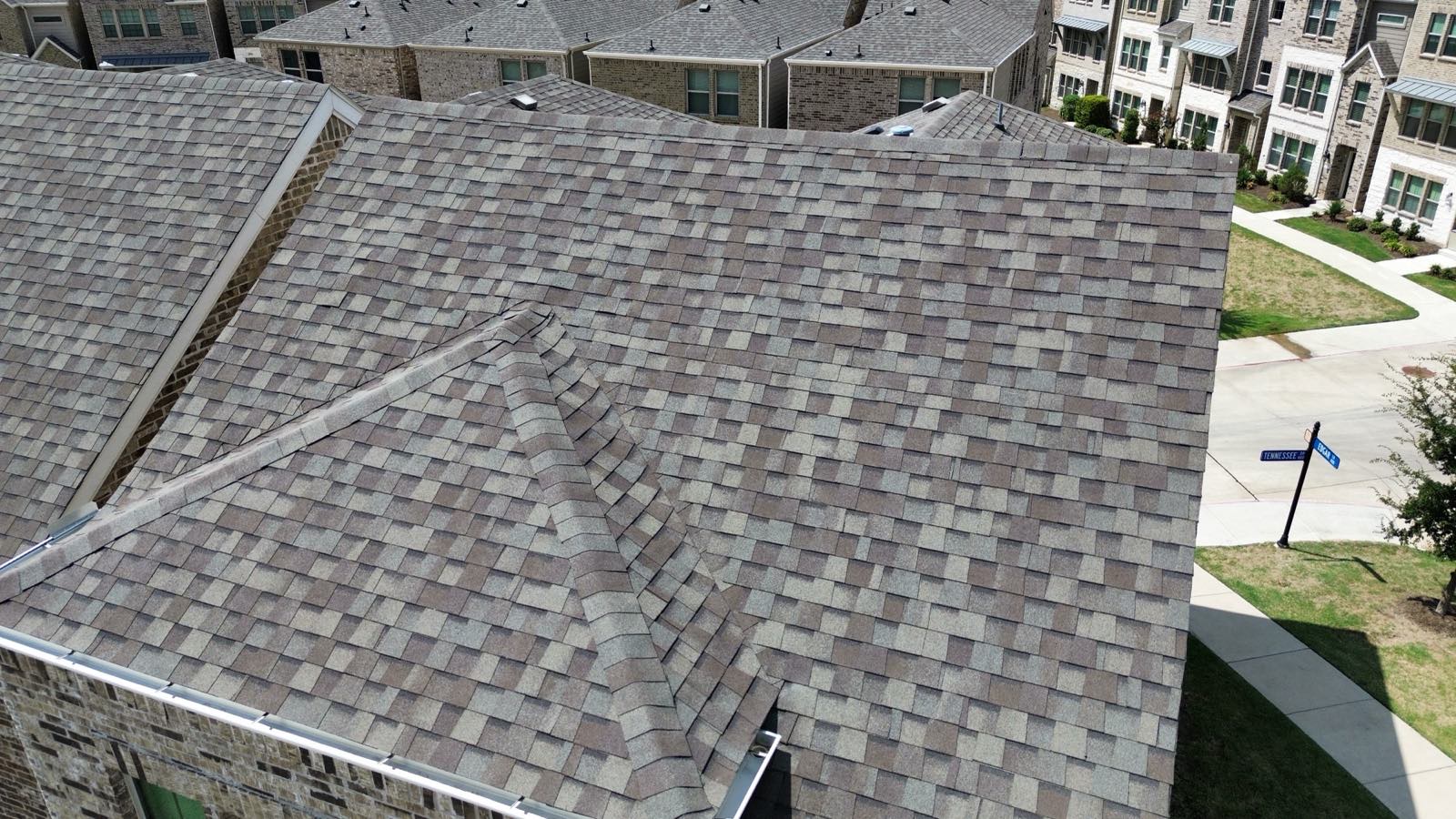 Large roof from above on a multi-unit building